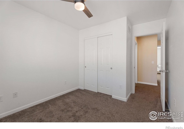 2832 William Neal Pkwy Unit C, Fort Collins, CO 80525 - unfurnished bedroom with visible vents, carpet flooring, baseboards, and a closet