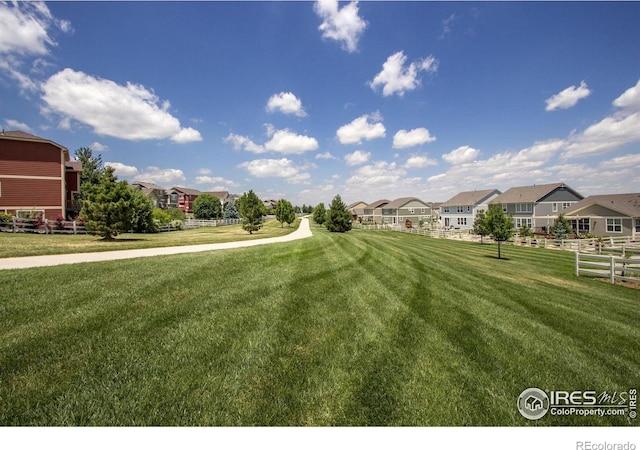 2832 William Neal Pkwy Unit C, Fort Collins, CO 80525 - exterior space with fence, a yard, and a residential view