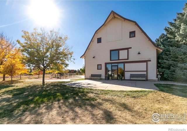 2832 William Neal Pkwy Unit C, Fort Collins, CO 80525 - view of side of home with a lawn and a barn