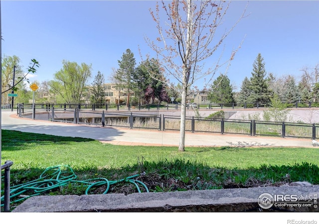 3785 Birchwood Dr, Boulder, CO 80304 - surrounding community with fence and a lawn