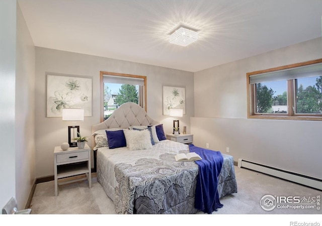 3785 Birchwood Dr, Boulder, CO 80304 - bedroom featuring baseboards, a baseboard heating unit, and carpet floors