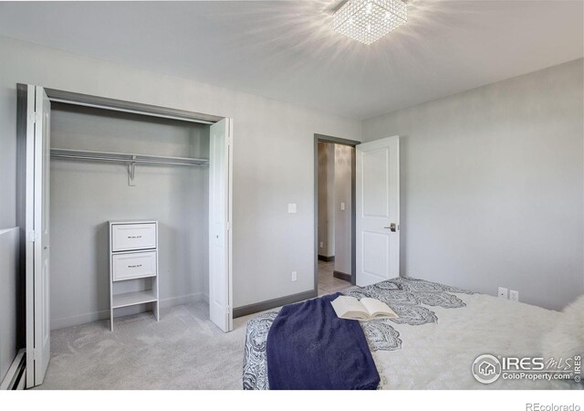 3785 Birchwood Dr, Boulder, CO 80304 - carpeted bedroom with baseboards and a closet
