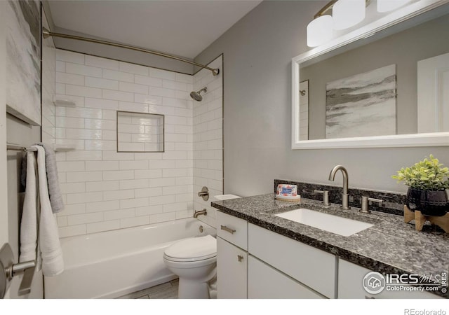 3785 Birchwood Dr, Boulder, CO 80304 - bathroom with toilet, vanity, and bathtub / shower combination