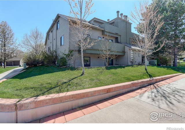 3785 Birchwood Dr, Boulder, CO 80304 - view of side of property featuring a lawn