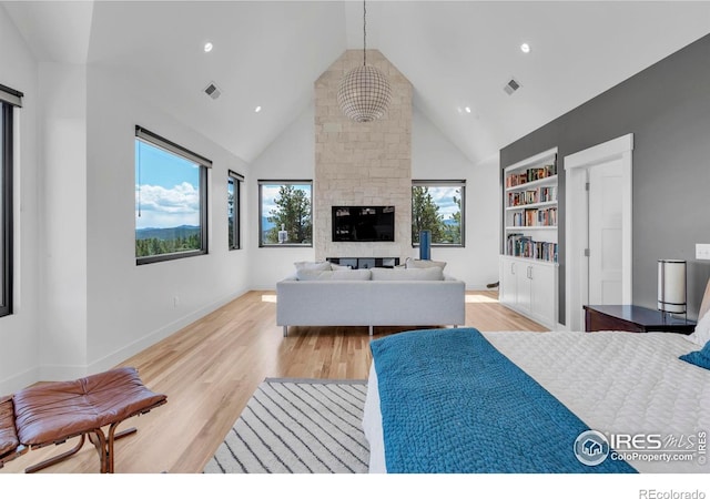 11 Juneau Cir, Nederland, CO 80466 - bedroom featuring visible vents, multiple windows, and light wood-style floors