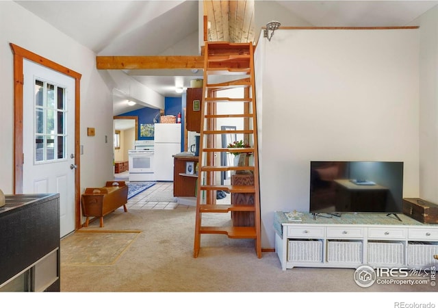 living area with carpet flooring and lofted ceiling