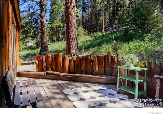deck featuring fence