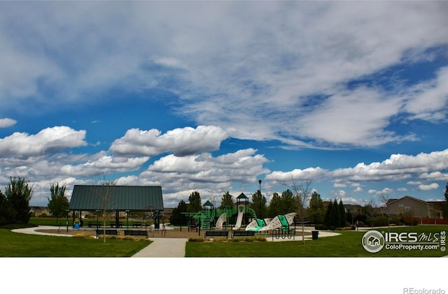 surrounding community featuring a lawn and playground community