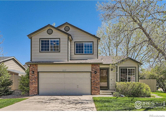 1507 Begonia Way, Superior, CO 80027 - view of front of home with brick siding, a garage, concrete driveway, and fence