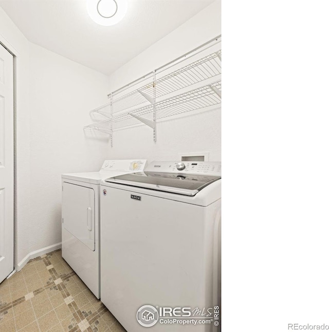 1507 Begonia Way, Superior, CO 80027 - washroom with separate washer and dryer and baseboards