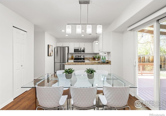 1507 Begonia Way, Superior, CO 80027 - dining room with baseboards, recessed lighting, and dark wood-type flooring