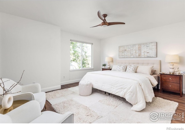 1507 Begonia Way, Superior, CO 80027 - bedroom featuring dark wood-style flooring, baseboards, and ceiling fan