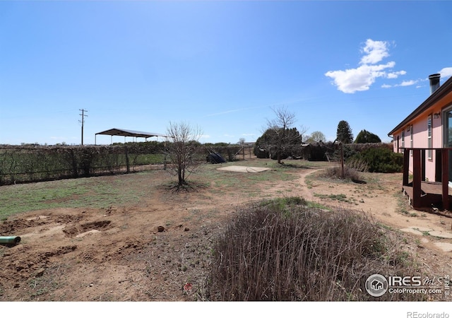 view of yard with fence