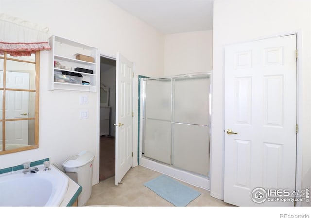 full bathroom with a garden tub and a stall shower