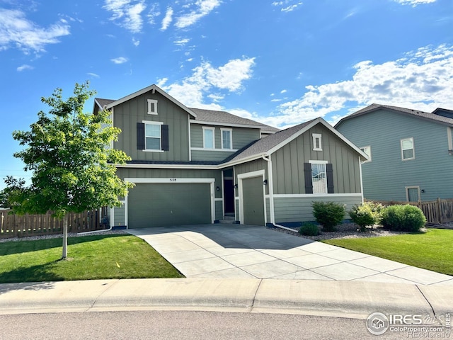 5128 Odessa Lake St, Timnath, CO 80547 - view of front of house featuring board and batten siding, concrete driveway, an attached garage, and a shingled roof