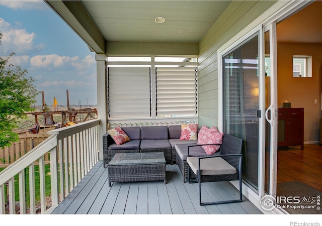 5128 Odessa Lake St, Timnath, CO 80547 - wooden deck featuring outdoor lounge area