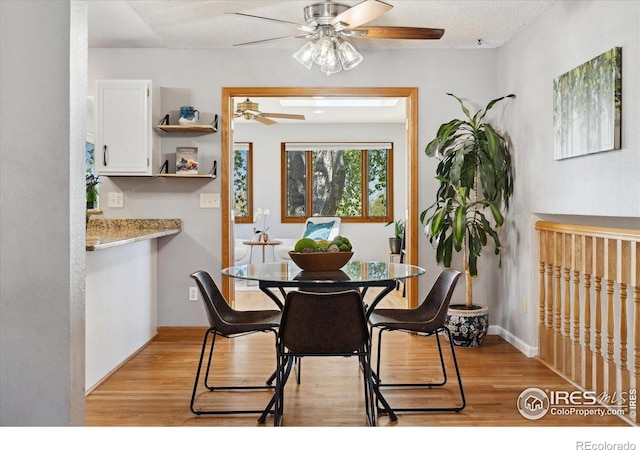 1309 Alexandria St, Lafayette, CO 80026 - dining space featuring a ceiling fan and light wood-style flooring