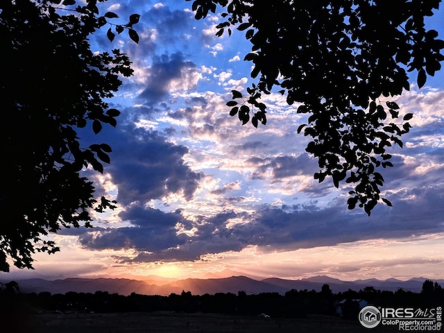 1309 Alexandria St, Lafayette, CO 80026 - nature at dusk featuring a mountain view