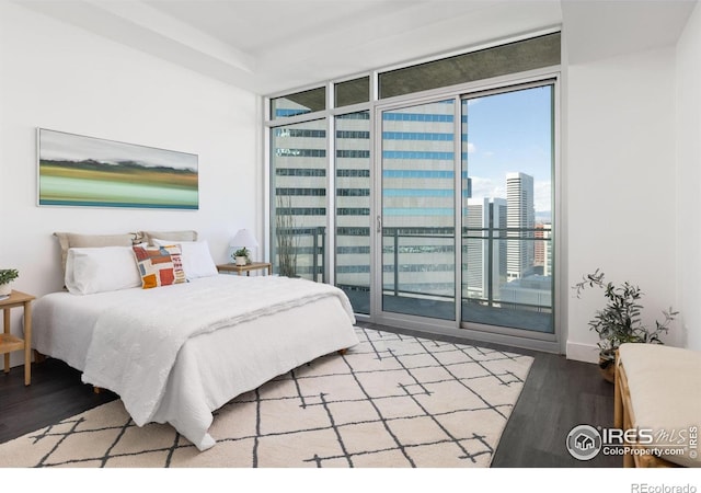 2001 Lincoln St Unit 2113, Denver, CO 80202 - bedroom with wood finished floors and access to exterior