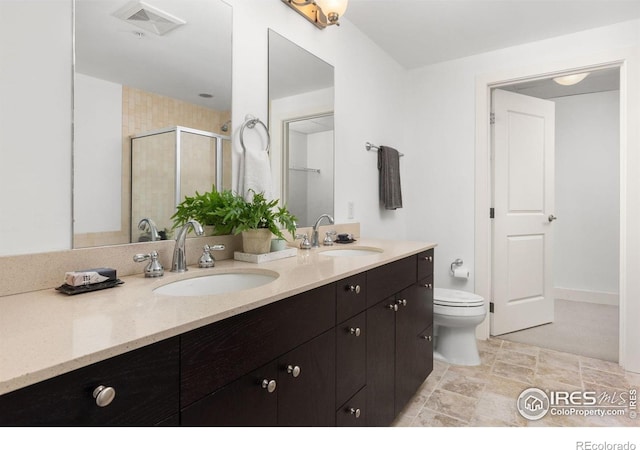 2001 Lincoln St Unit 2113, Denver, CO 80202 - full bathroom featuring double vanity, a stall shower, and stone finish floors