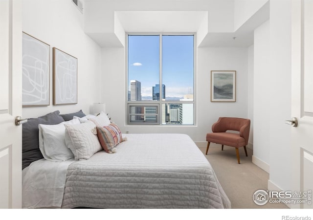 2001 Lincoln St Unit 2113, Denver, CO 80202 - bedroom featuring carpet and a view of skyline