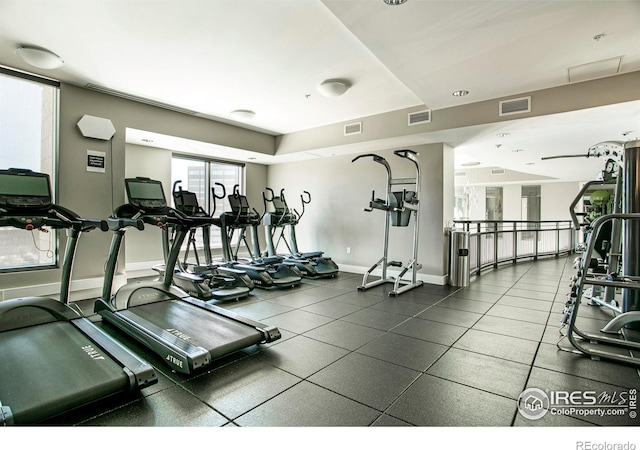 2001 Lincoln St Unit 2113, Denver, CO 80202 - exercise room featuring baseboards