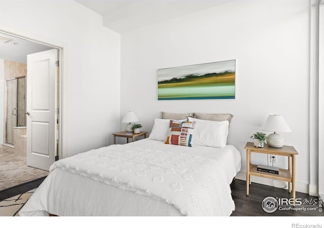 2001 Lincoln St Unit 2113, Denver, CO 80202 - bedroom with wood finished floors and ensuite bathroom