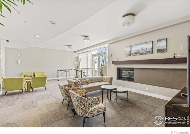 2001 Lincoln St Unit 2113, Denver, CO 80202 - living room featuring carpet floors and a glass covered fireplace