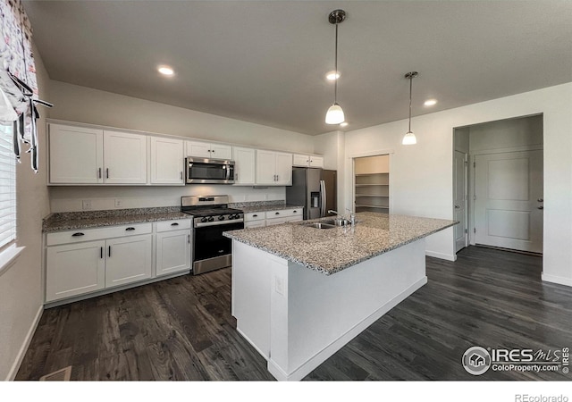 2325 Mountain Sky Dr, Fort Lupton, CO 80621 - kitchen with appliances with stainless steel finishes, dark wood-type flooring, a sink, baseboards, and recessed lighting
