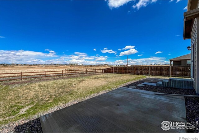 2325 Mountain Sky Dr, Fort Lupton, CO 80621 - view of yard with a patio and a rural view