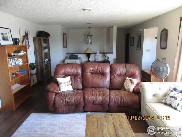13969 County Road 33, Sterling, CO 80751 - living room with a textured ceiling and wood finished floors