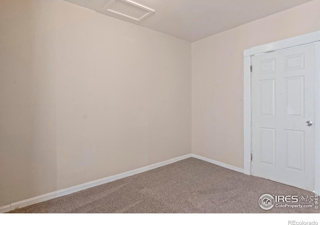 1626 11th Ave, Greeley, CO 80631 - carpeted empty room featuring attic access and baseboards