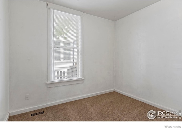 1626 11th Ave, Greeley, CO 80631 - carpeted spare room featuring baseboards