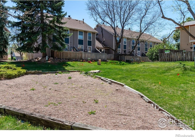 view of yard with fence