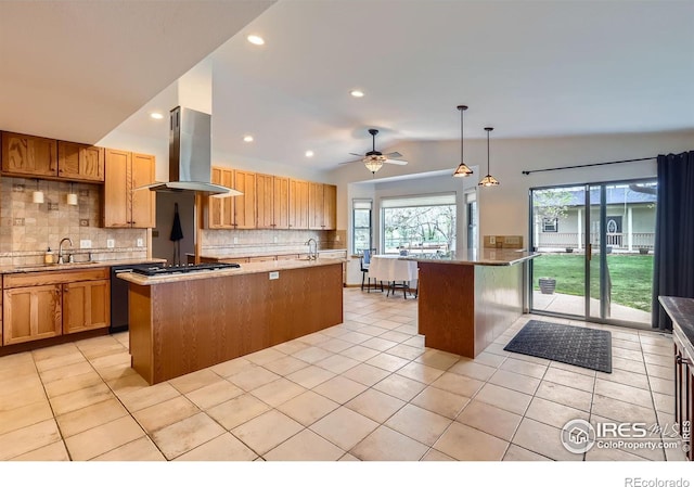 1720 Chaparro Cir, Berthoud, CO 80513 - kitchen featuring light tile patterned floors, a sink, island range hood, a kitchen island with sink, and backsplash