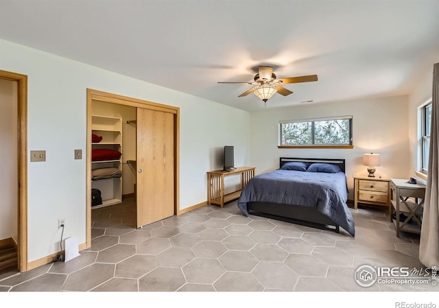 1720 Chaparro Cir, Berthoud, CO 80513 - bedroom with a closet, baseboards, a ceiling fan, and a spacious closet