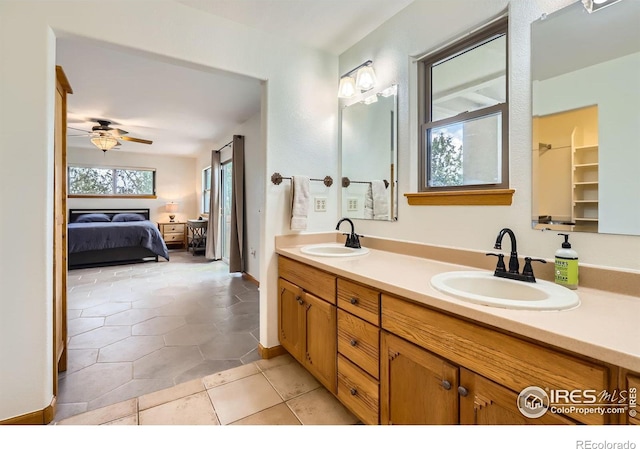 1720 Chaparro Cir, Berthoud, CO 80513 - ensuite bathroom featuring tile patterned flooring, ensuite bath, double vanity, and a sink