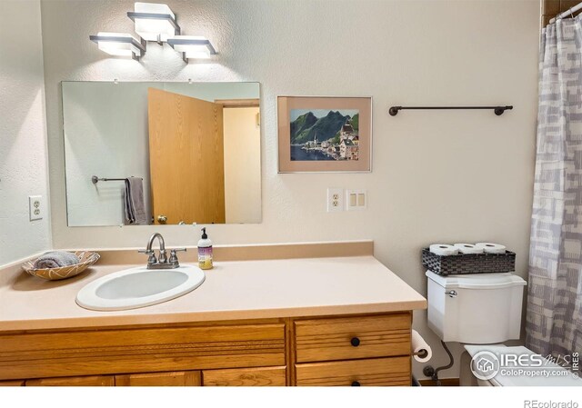 1720 Chaparro Cir, Berthoud, CO 80513 - full bathroom featuring vanity and toilet