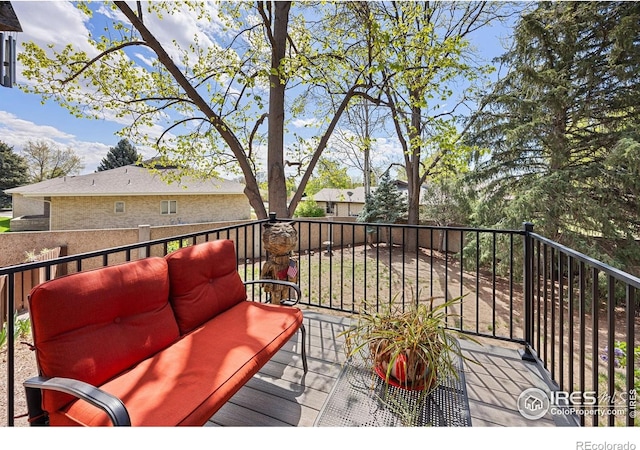 deck with an outdoor hangout area