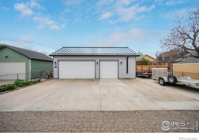 garage featuring fence