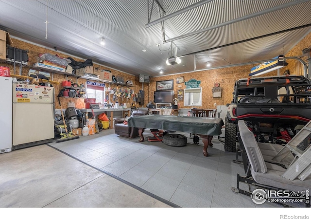 garage featuring freestanding refrigerator