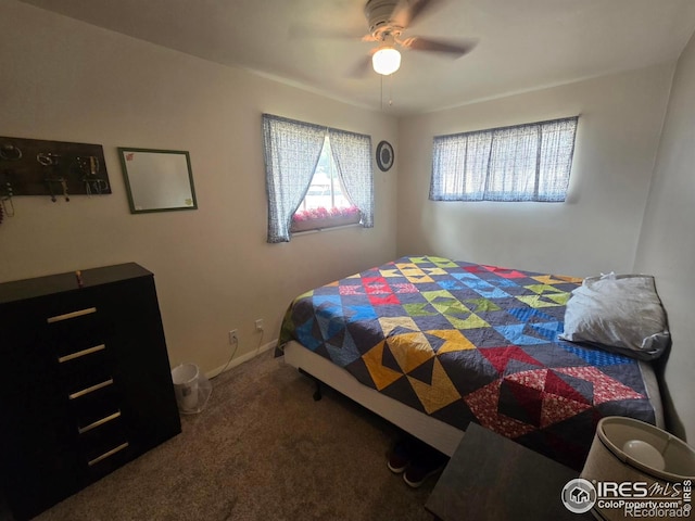 bedroom featuring a ceiling fan and carpet floors