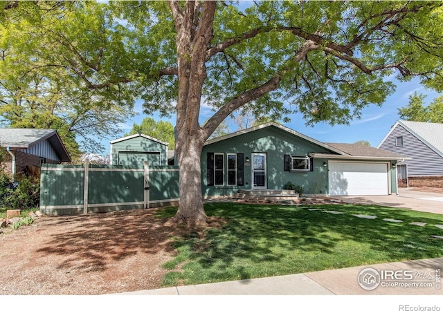3115 Custer Ave, Loveland, CO 80538 - single story home with an attached garage, driveway, and stucco siding