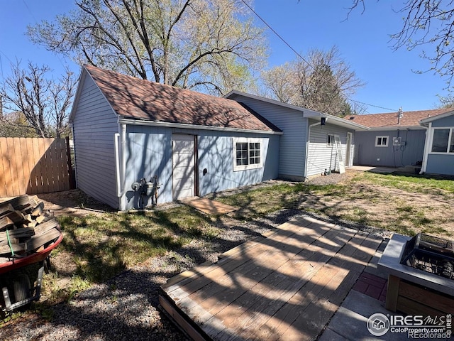 618 Melody Ln, Sterling, CO 80751 - exterior space with a fire pit and fence