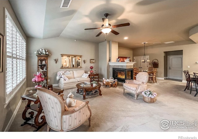 1379 Charles Dr Unit 4, Longmont, CO 80503 - living area with carpet, baseboards, visible vents, and a tile fireplace