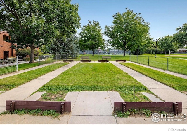 1379 Charles Dr Unit 4, Longmont, CO 80503 - view of home's community featuring a yard and fence