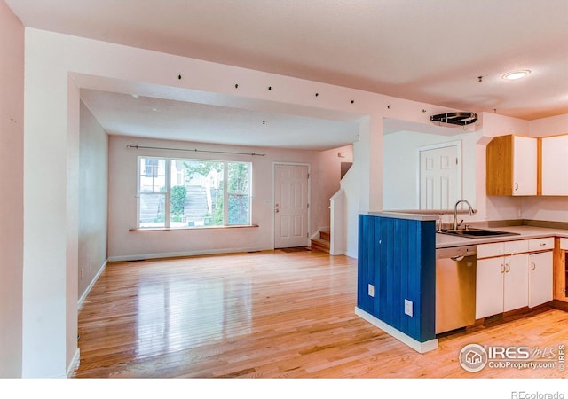 3840 Colorado Ave Unit D, Boulder, CO 80303 - kitchen with light wood-style flooring, a sink, open floor plan, white cabinets, and stainless steel dishwasher