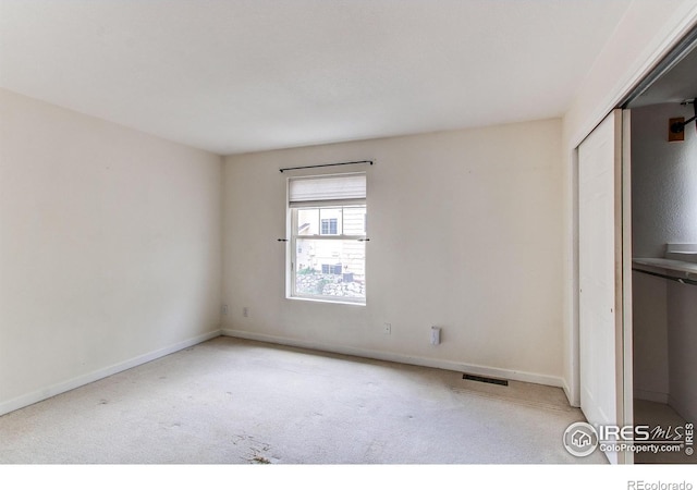 3840 Colorado Ave Unit D, Boulder, CO 80303 - unfurnished bedroom with carpet, a closet, baseboards, and visible vents