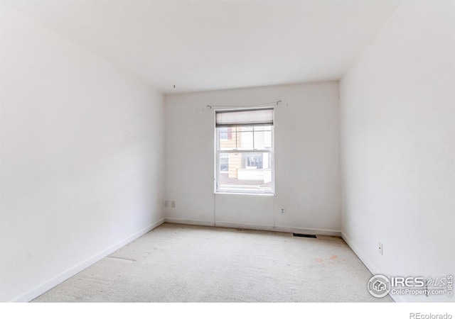 3840 Colorado Ave Unit D, Boulder, CO 80303 - carpeted spare room featuring visible vents and baseboards