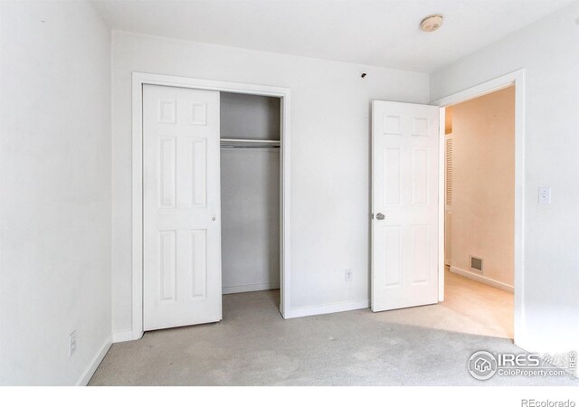 3840 Colorado Ave Unit D, Boulder, CO 80303 - unfurnished bedroom featuring carpet, visible vents, baseboards, and a closet